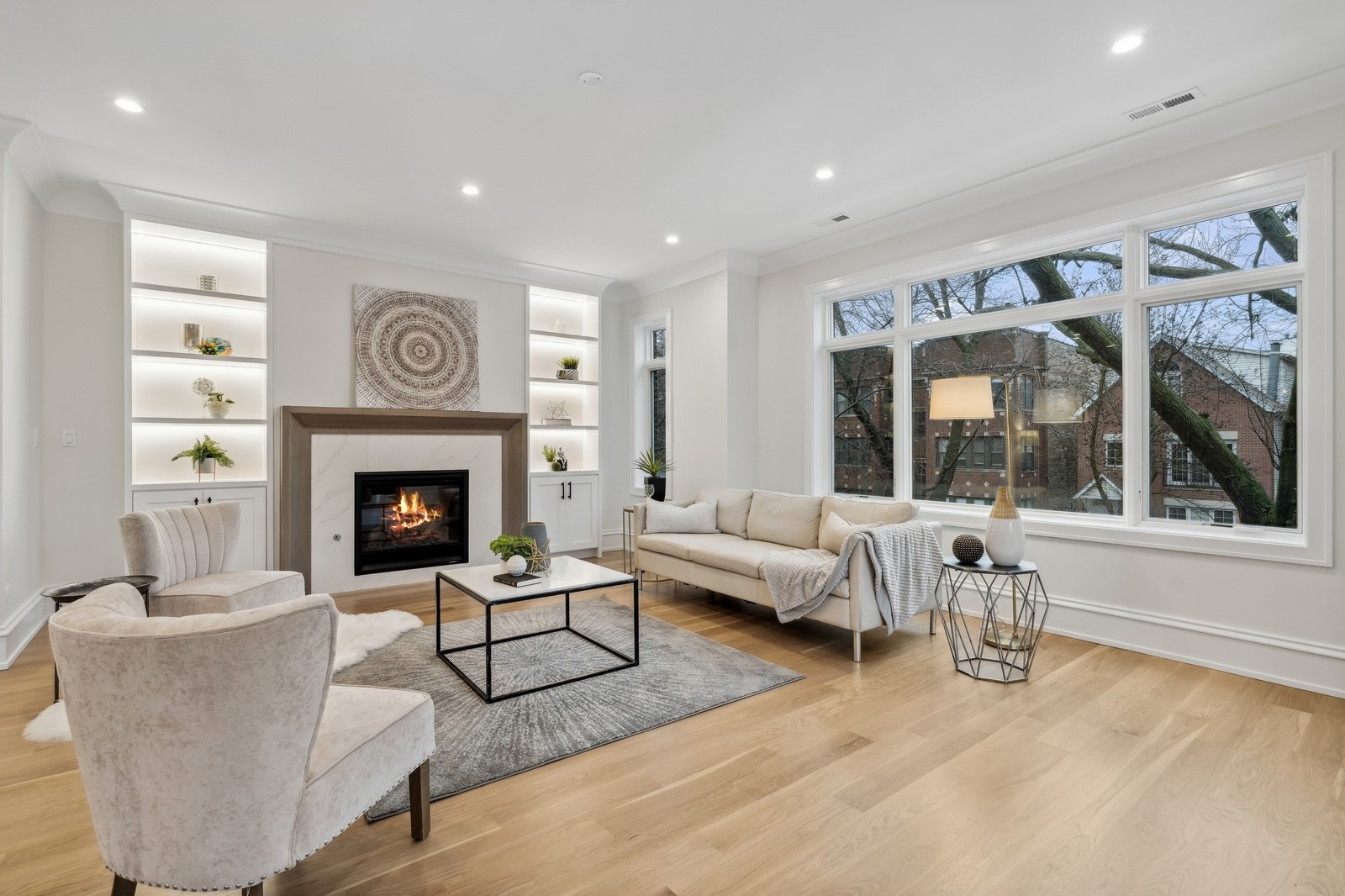 1511 West Byron Street, Unit 2 Chicago, IL 60613 - Photo 2 of 21 a living room with furniture and a fireplace