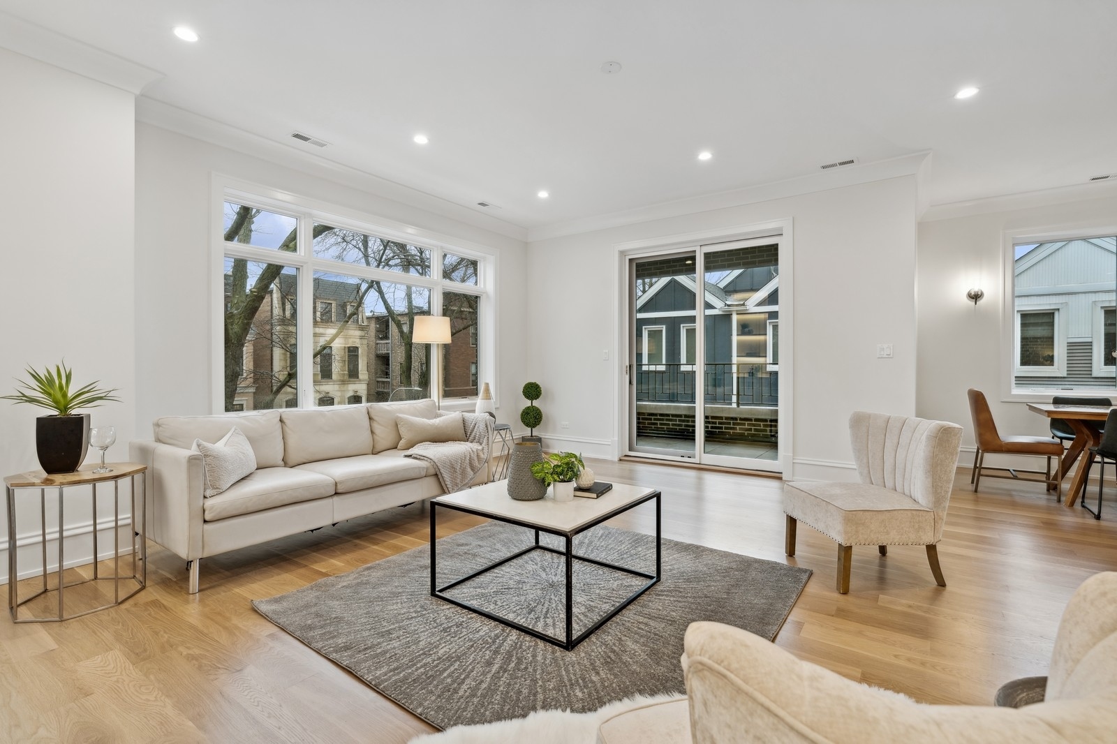 1511 West Byron Street, Unit 2 Chicago, IL 60613 - Photo 6 of 21 a living room with furniture and a large window