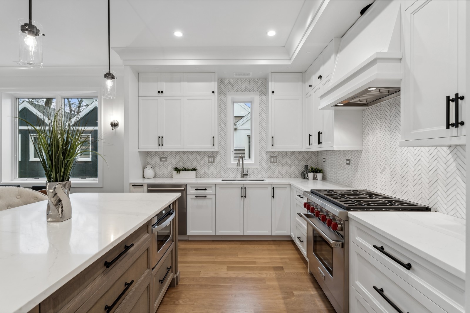 1511 West Byron Street, Unit 2 Chicago, IL 60613 - Photo 8 of 21 a kitchen with stainless steel appliances a sink stove and cabinets