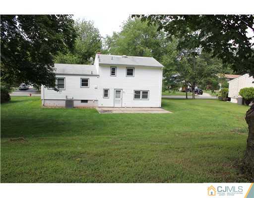 10 Butler Road Edison, NJ 08820 - Photo 12 of 13 a view of a house with a yard