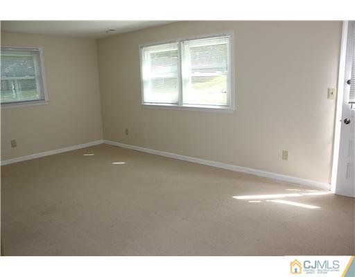 10 Butler Road Edison, NJ 08820 - Photo 4 of 13 a view of an empty room with a window