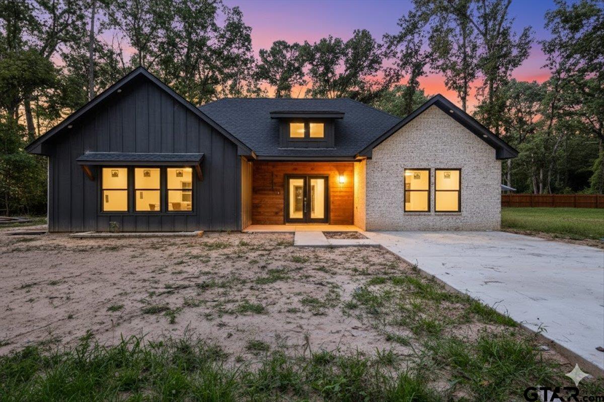 147 Arvel Street Bullard, TX 75757 - Photo 2 of 23 a front view of a house with a yard and garage