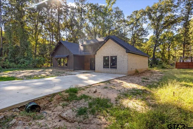 a house view with a garden space