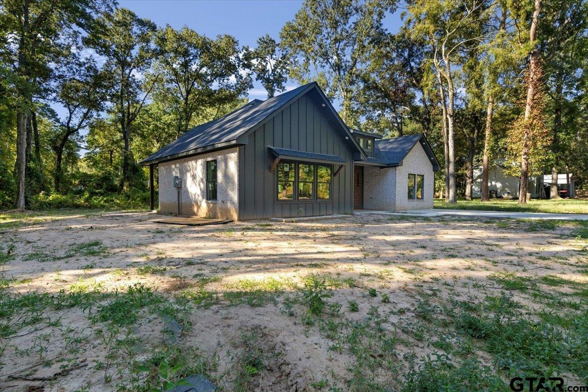 147 Arvel Street Bullard, TX 75757 - Photo 6 of 23 a house view with a garden space