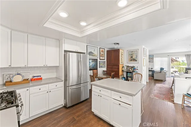 a view of livingroom with hardwood floor and a ceiling fan