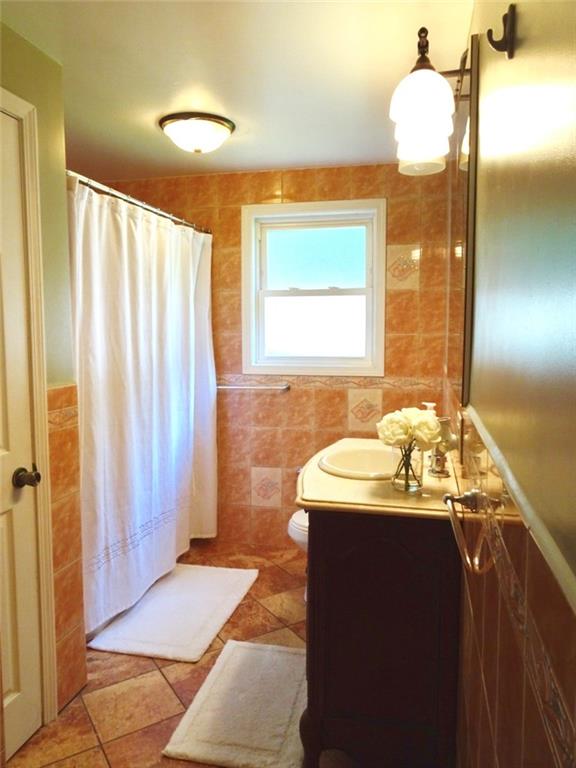 519 Beatty Road Monroeville, PA 15146 - Photo 9 of 25 Bathroom is large with Tile floors, updated fixtures and a large linen closet