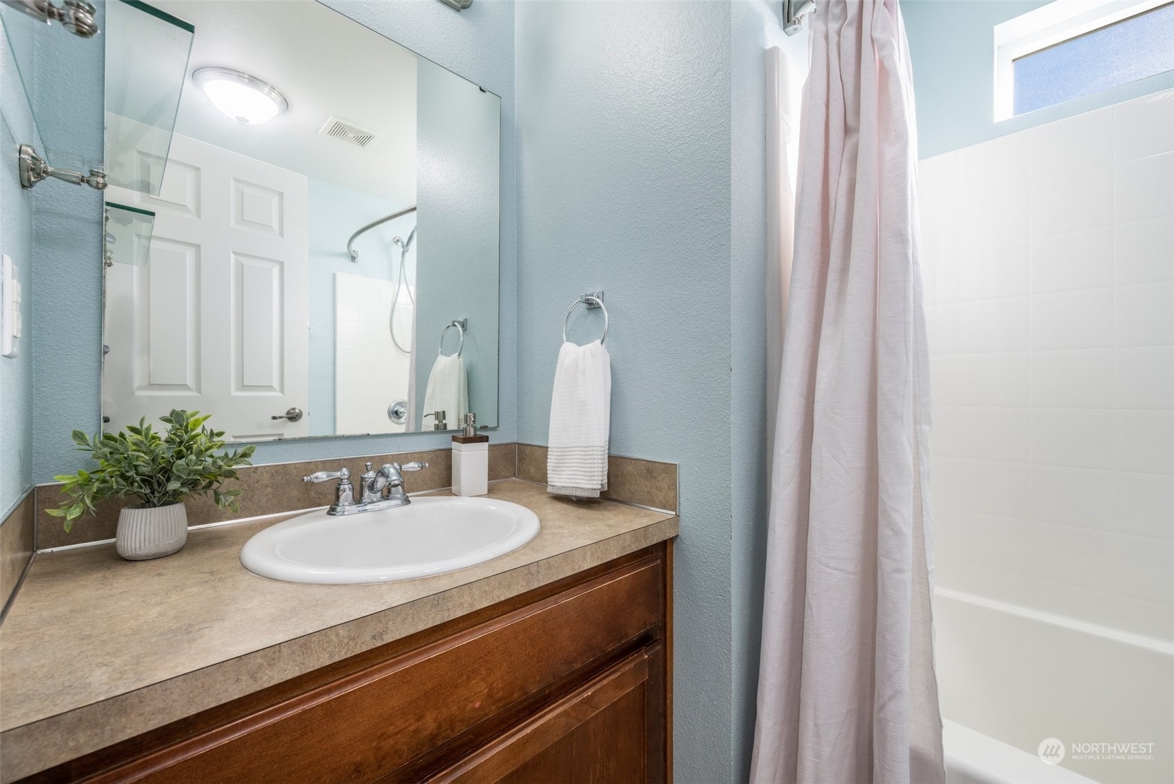 20122 Shamon Court Southwest Centralia, WA 98531 - Photo 24 of 40 a bathroom with a sink and a mirror