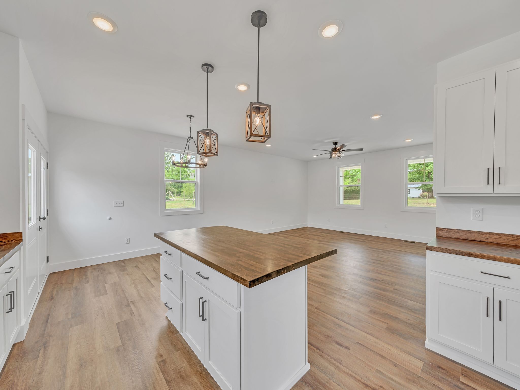 5800 Sanders Road Lyles, TN 37098 - Photo 11 of 28 a kitchen that has a sink a window stainless steel appliances and cabinets
