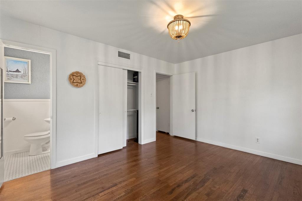 3304 Crest Ridge Drive Dallas, TX 75228 - Photo 12 of 16 a view of an empty room with wooden floor