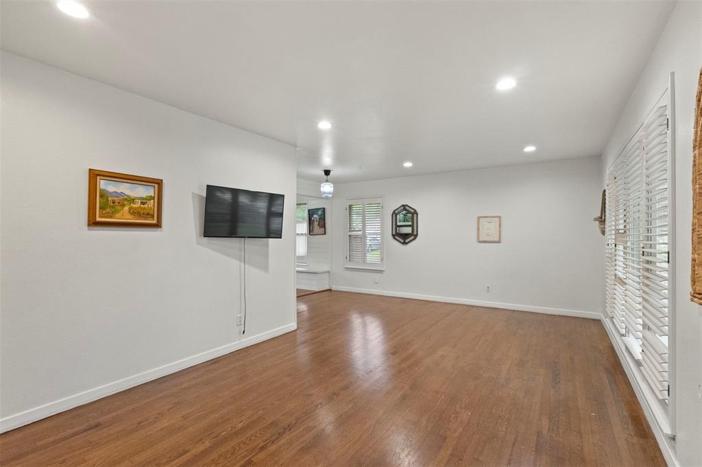 3304 Crest Ridge Drive Dallas, TX 75228 - Photo 2 of 16 a view of a livingroom with wooden floor
