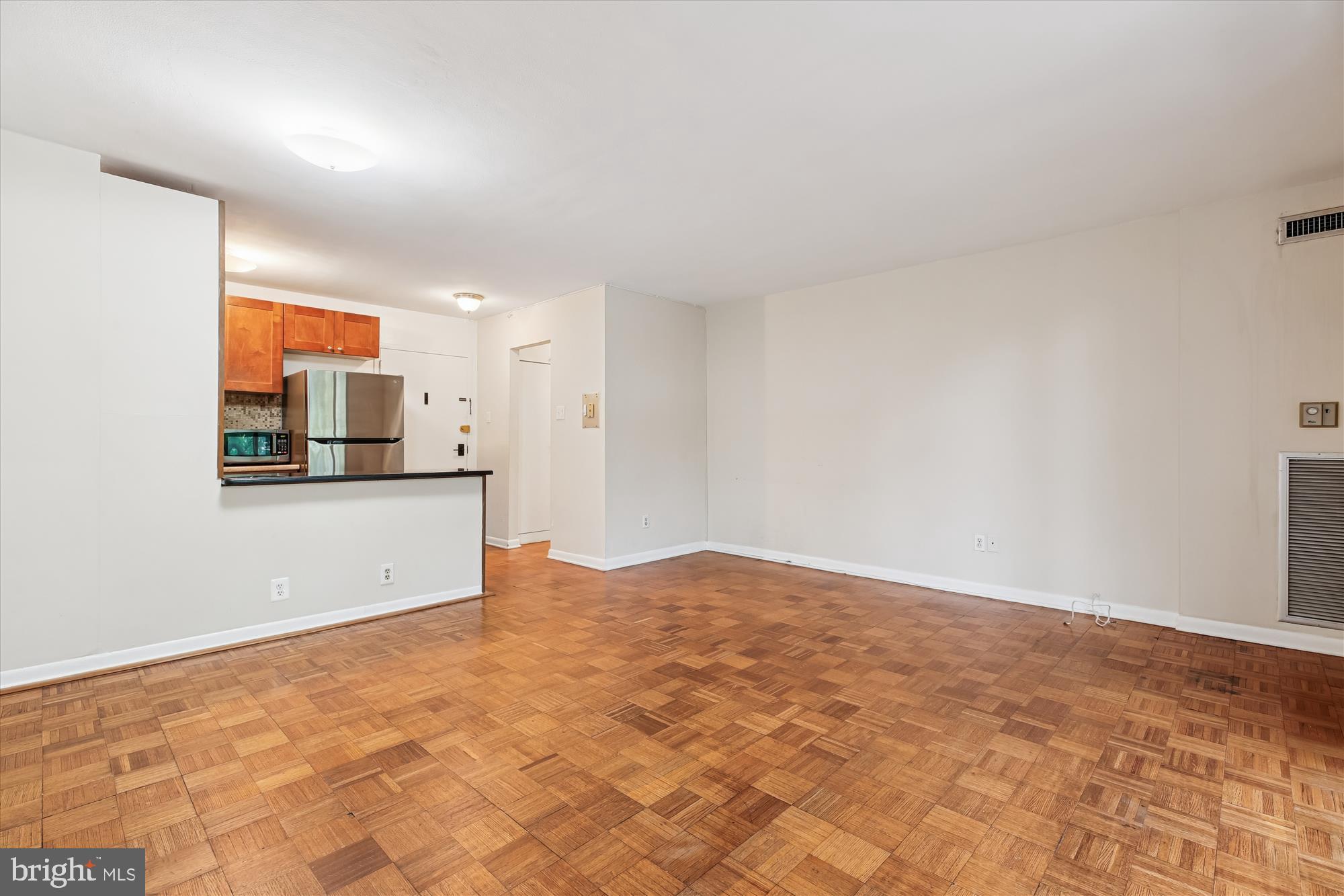 950 25th Street Northwest, Unit 709N Washington, DC 20037 - Photo 13 of 49 a view of kitchen and a window