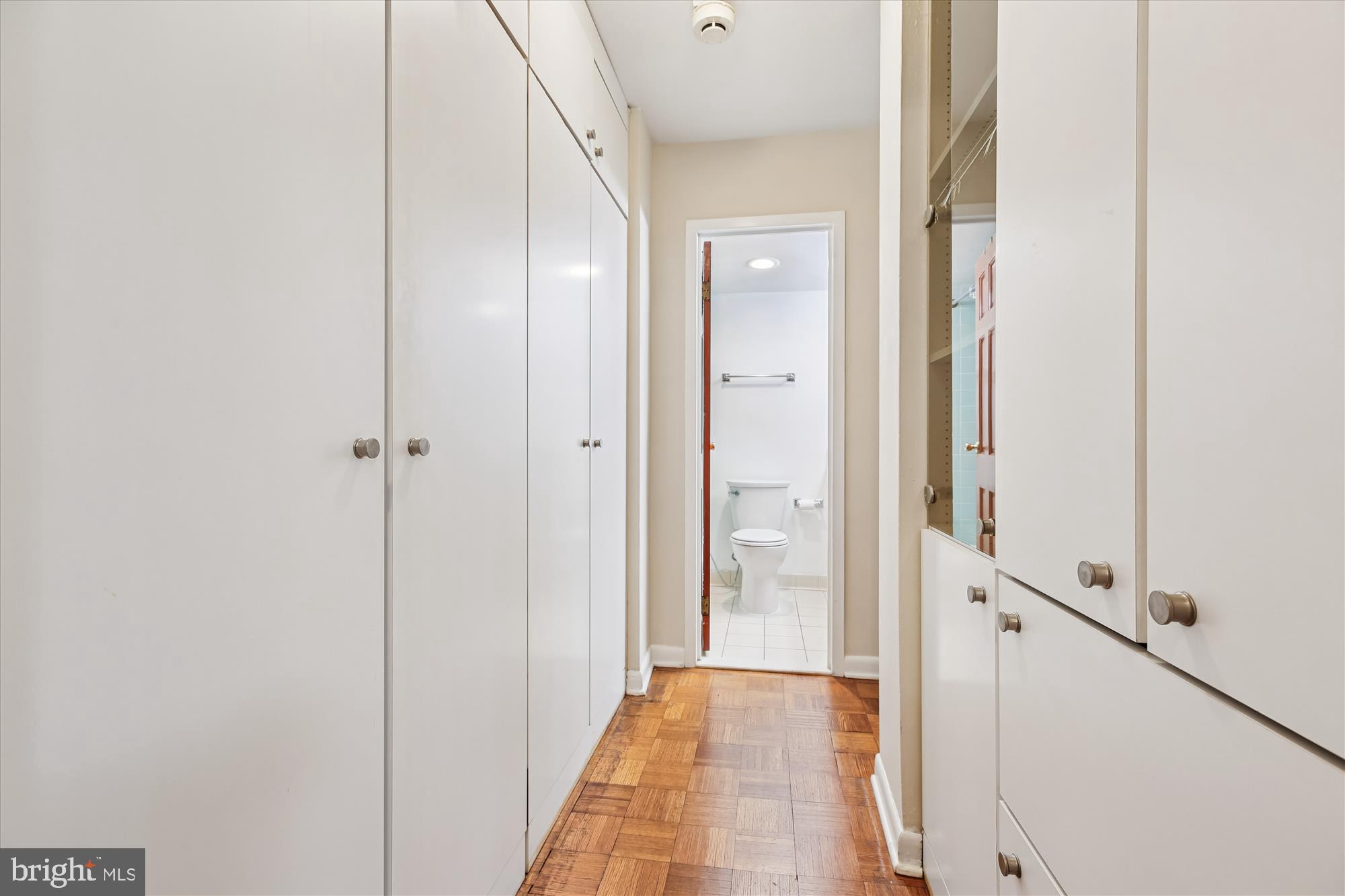 950 25th Street Northwest, Unit 709N Washington, DC 20037 - Photo 18 of 49 a view of a hallway with a glass door shower