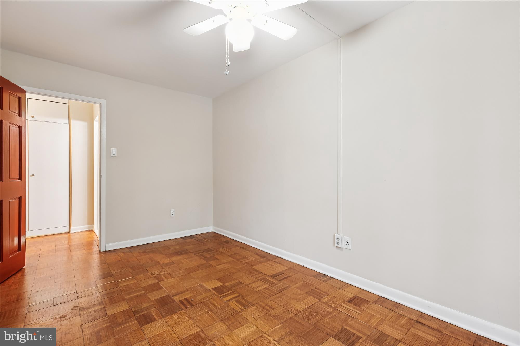 950 25th Street Northwest, Unit 709N Washington, DC 20037 - Photo 21 of 49 an empty room with wooden floor and windows