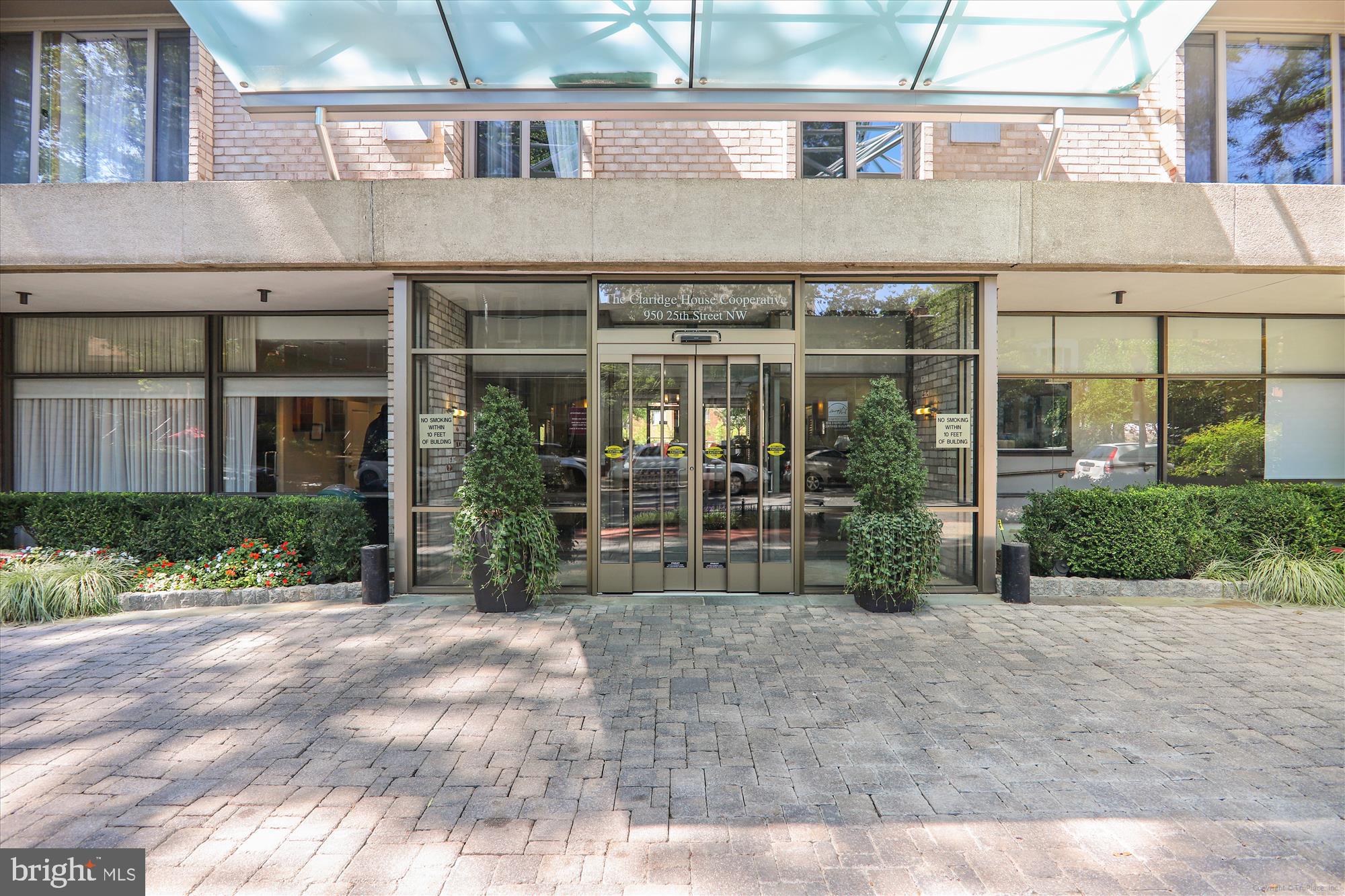 950 25th Street Northwest, Unit 709N Washington, DC 20037 - Photo 25 of 49 a view of a brick building next to a yard
