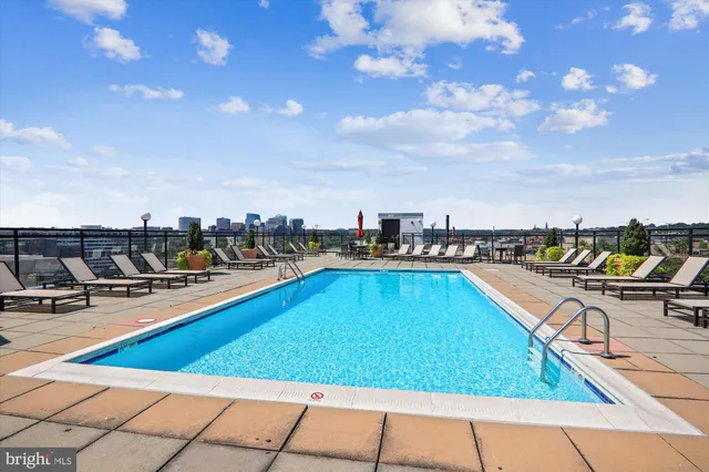 a view of a balcony with wooden floor