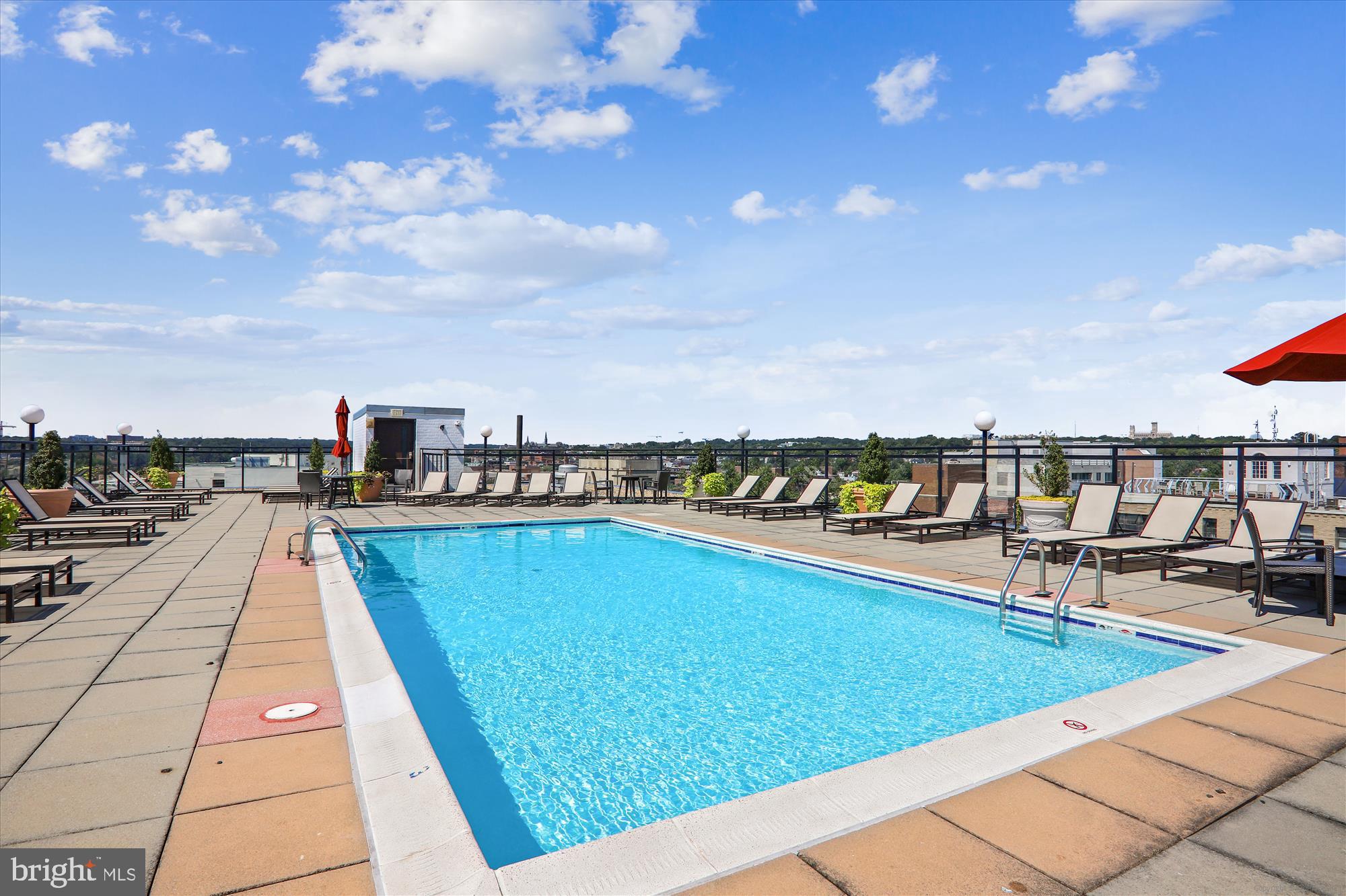 950 25th Street Northwest, Unit 709N Washington, DC 20037 - Photo 29 of 52 a view of swimming pool with outdoor seating