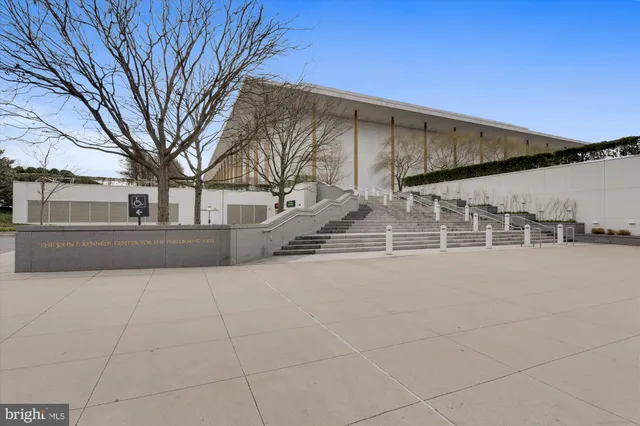 a sign on a pole on a street