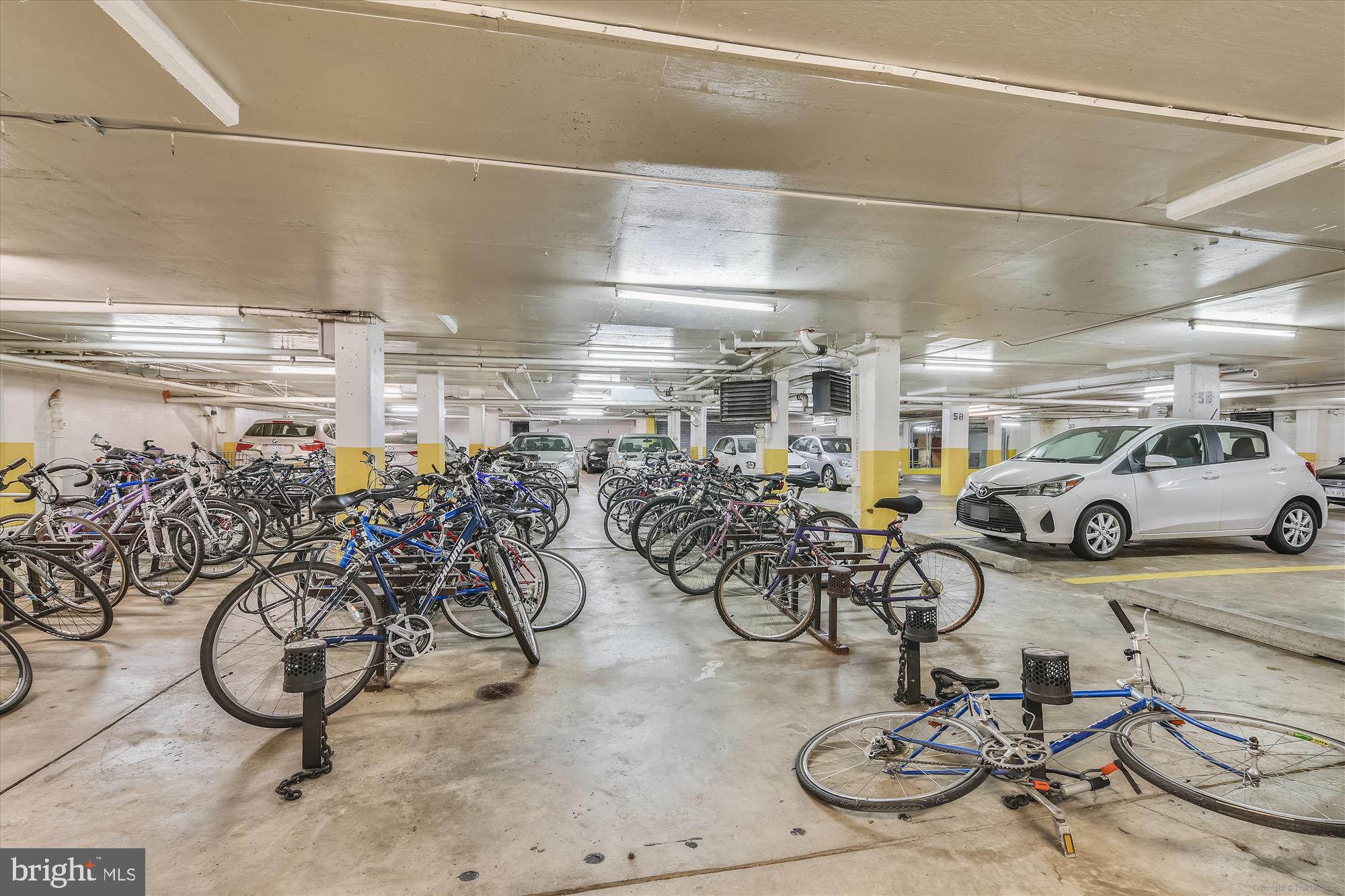 950 25th Street Northwest, Unit 709N Washington, DC 20037 - Photo 44 of 52 a view of a bike storage in a garage
