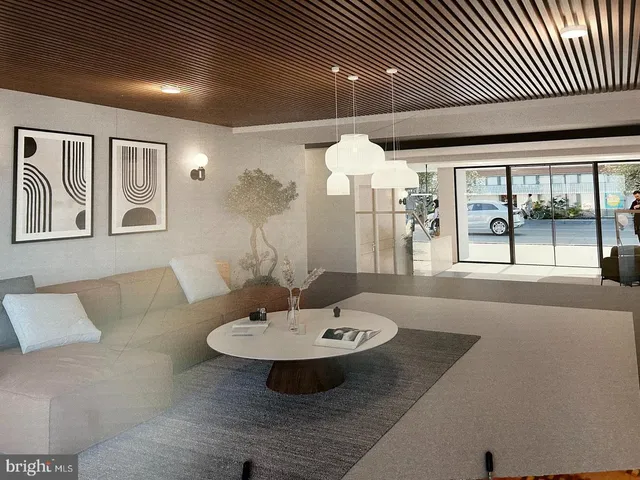 a view of a livingroom with furniture and window