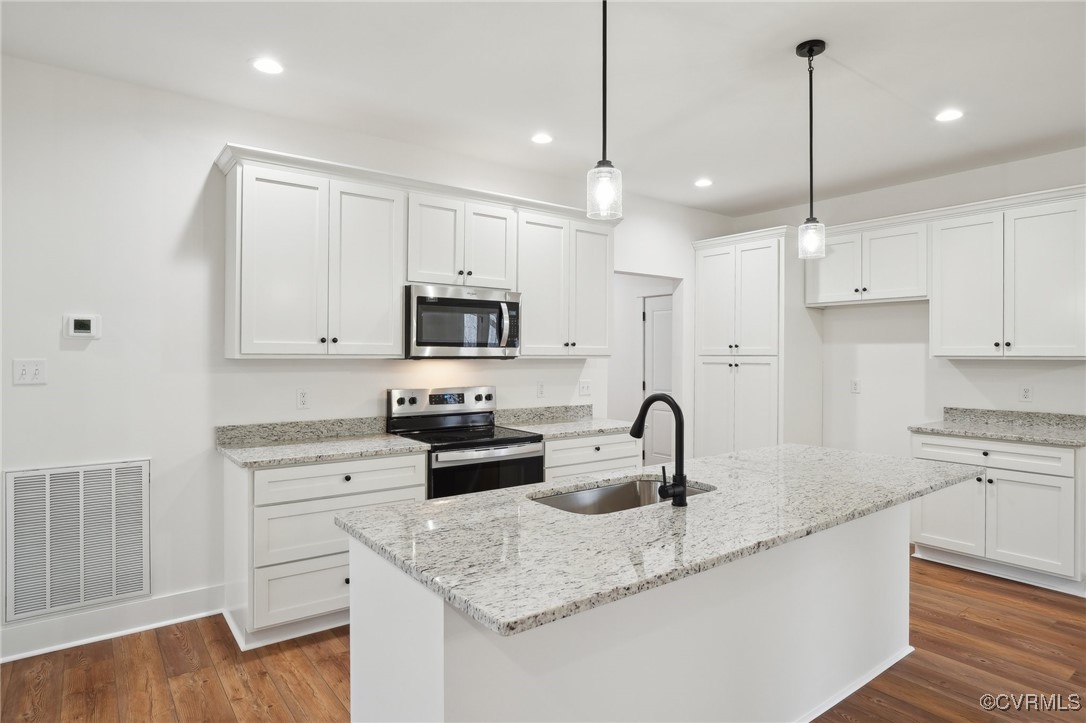 2359 Cedar Hill Road Mineral, VA 23117 - Photo 14 of 36 a kitchen with appliances a sink and cabinets