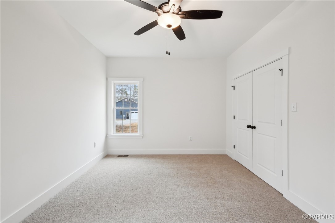 2359 Cedar Hill Road Mineral, VA 23117 - Photo 30 of 36 an empty room with ceiling fan and window