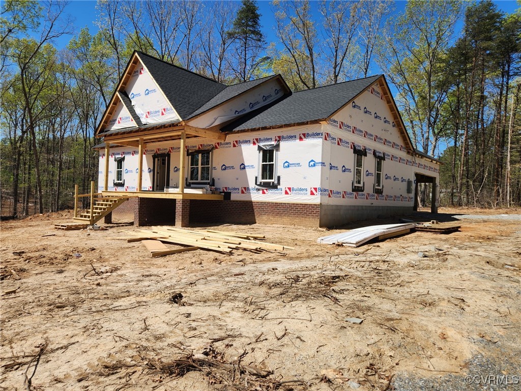 2359 Cedar Hill Road Mineral, VA 23117 - Photo 4 of 36 a view of a house with snow on the road