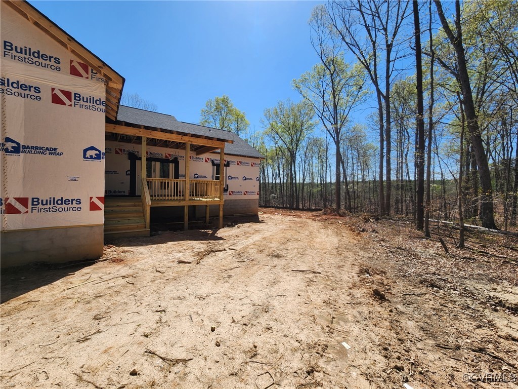 2359 Cedar Hill Road Mineral, VA 23117 - Photo 5 of 36 a view of a house with a snow in the yard