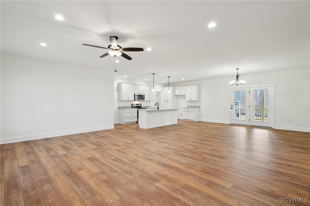 2359 Cedar Hill Road Mineral, VA 23117 - Photo 7 of 36 a view of a kitchen with a sink and a stove top oven