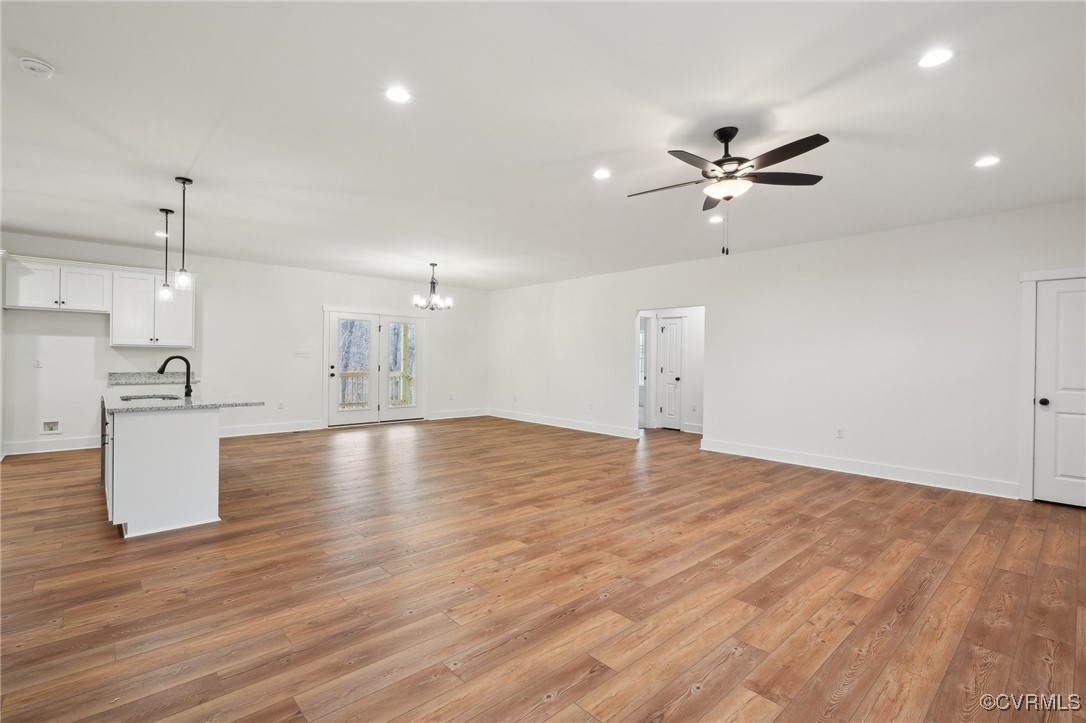 2359 Cedar Hill Road Mineral, VA 23117 - Photo 8 of 36 a view of empty room with wooden floor and ceiling fan