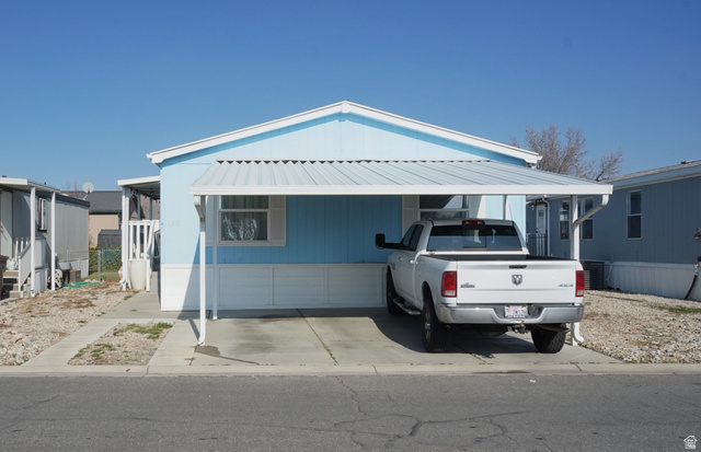 1210 River Bank Road West Valley City, UT 84119 - Photo 1 of 1 Manufactured / mobile home featuring a metal roof