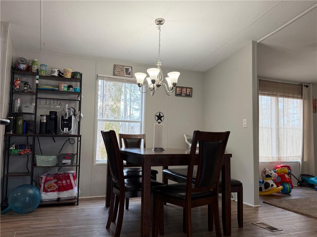 828 Harrison Road Carrollton, GA 30117 - Photo 5 of 20 a dining room with furniture and window