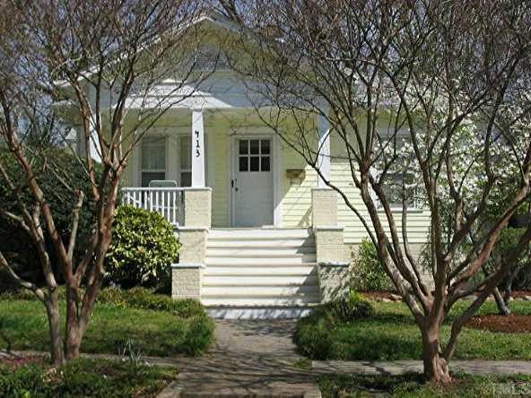 413 Frank Street Raleigh, NC 27604 - Photo 1 of 1 a front view of a house with a garden