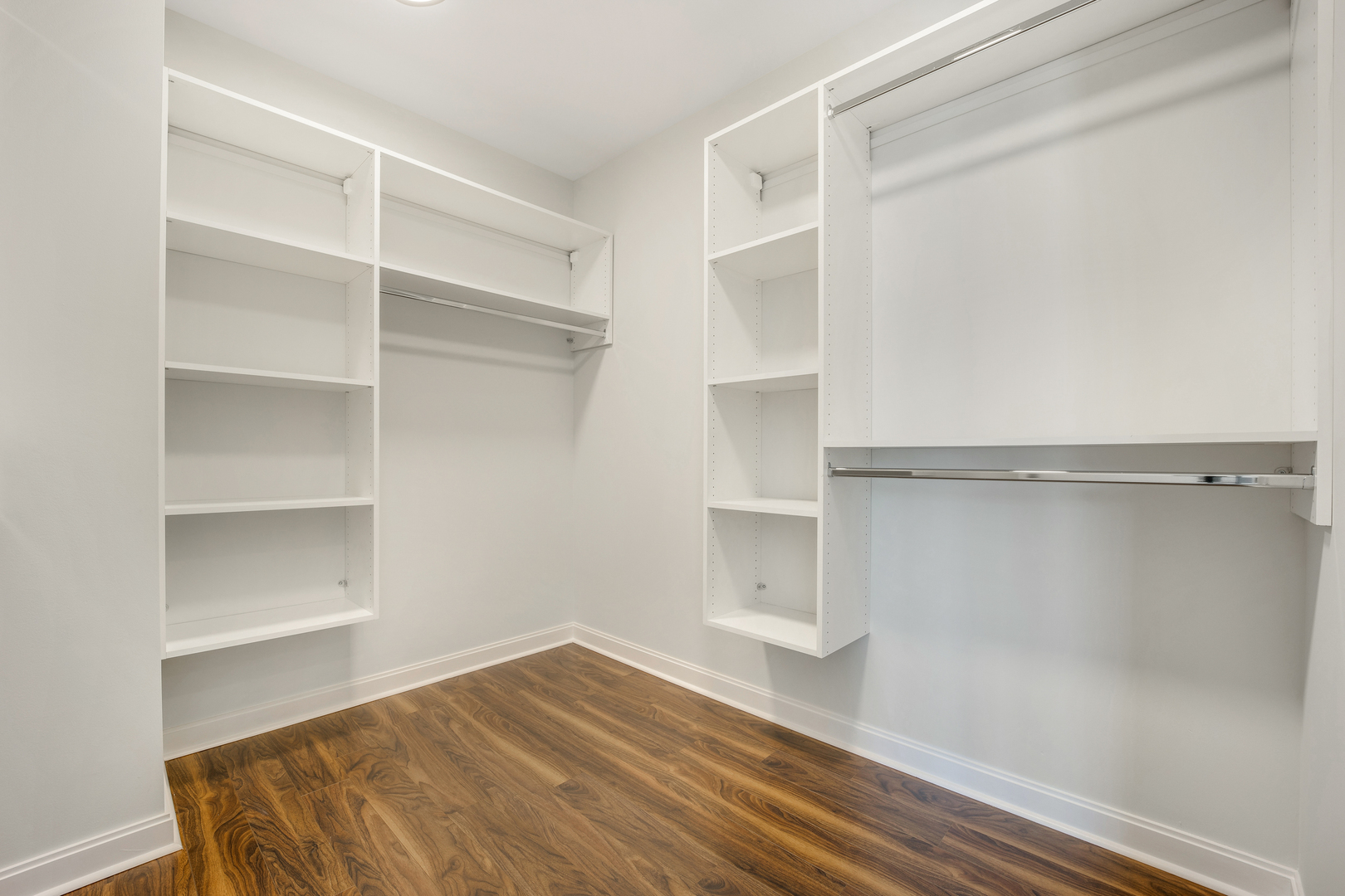 111 West Wacker Drive, Unit PH01 Chicago, IL 60601 - Photo 11 of 37 a view of a room with storage and racks on wall