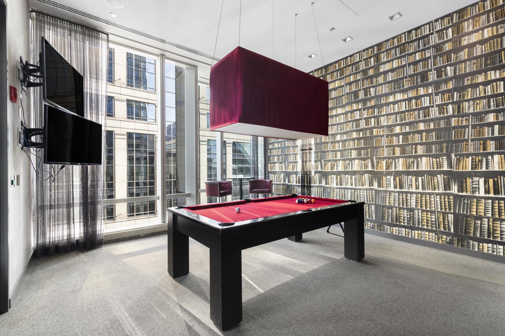 111 West Wacker Drive, Unit PH01 Chicago, IL 60601 - Photo 28 of 37 a room with pool table and windows