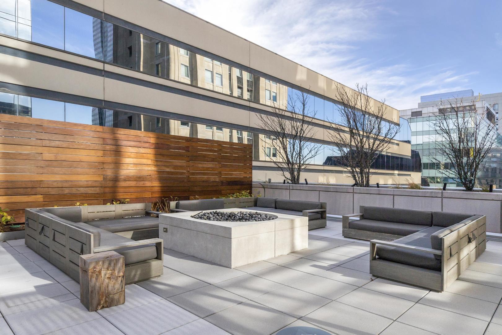 111 West Wacker Drive, Unit PH01 Chicago, IL 60601 - Photo 32 of 37 a outdoor space with patio furniture