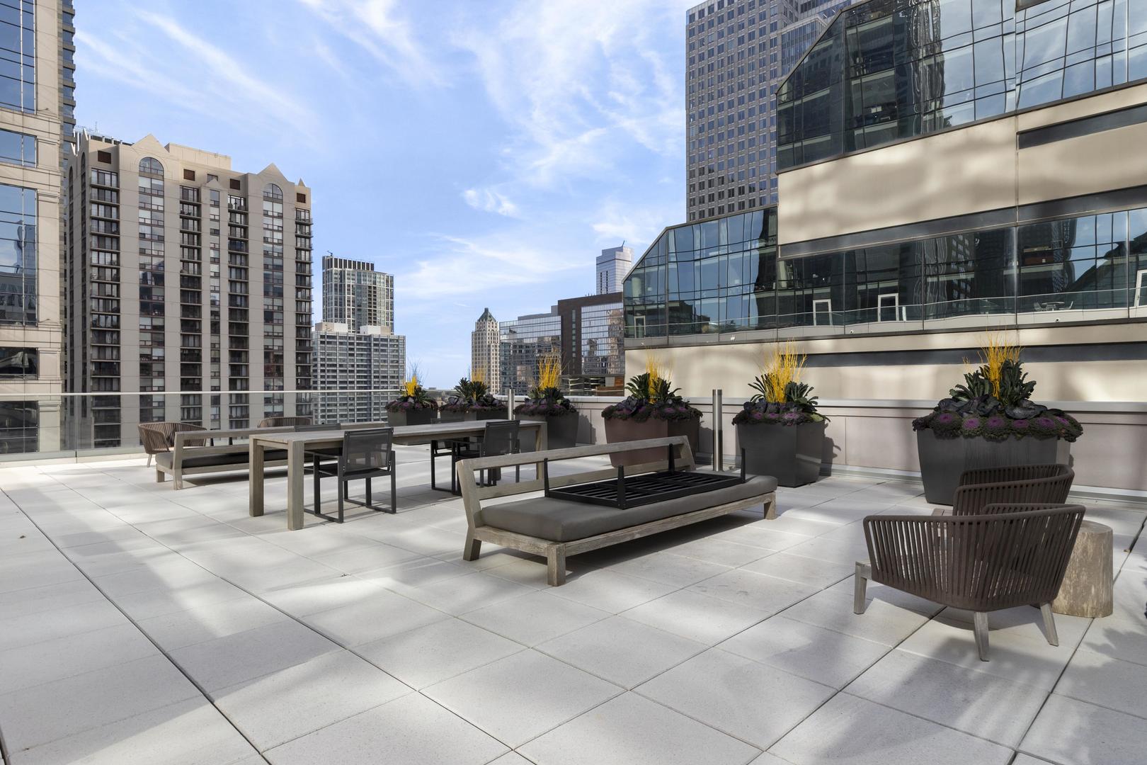 111 West Wacker Drive, Unit PH01 Chicago, IL 60601 - Photo 33 of 37 a lobby with furniture and outdoor seating