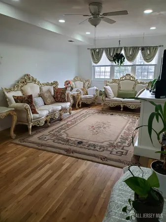 a living room with furniture and a table