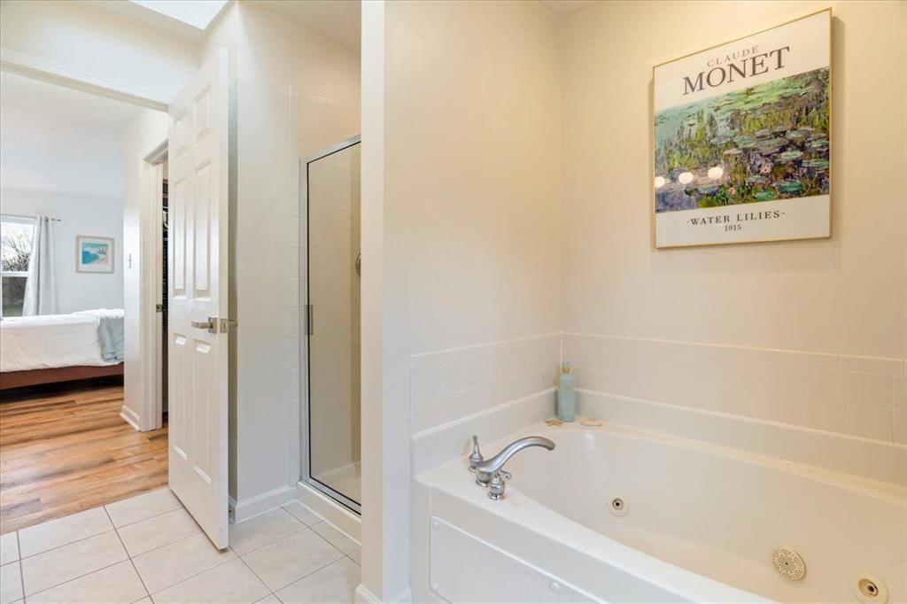 216 Lori Road Gibsonia, PA 15044 - Photo 23 of 49 A separate walk-in shower and large soaking tub offer the best of both comfort and function.