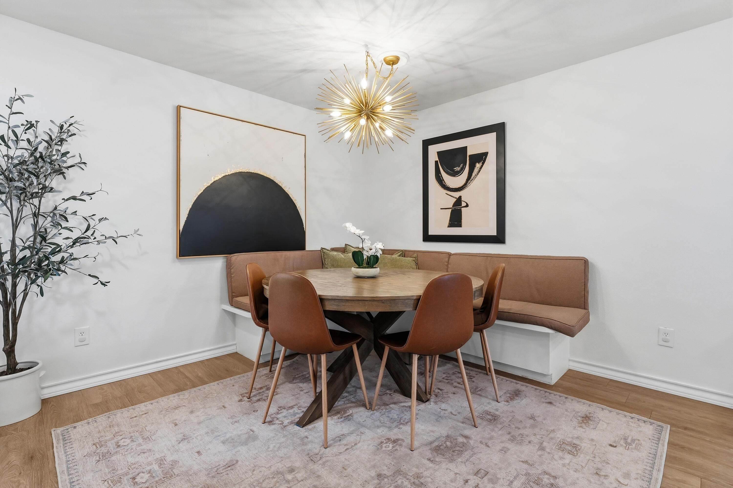 4628 94th Street Lubbock, TX 79424 - Photo 17 of 41 a view of a dining room with furniture and wooden floor