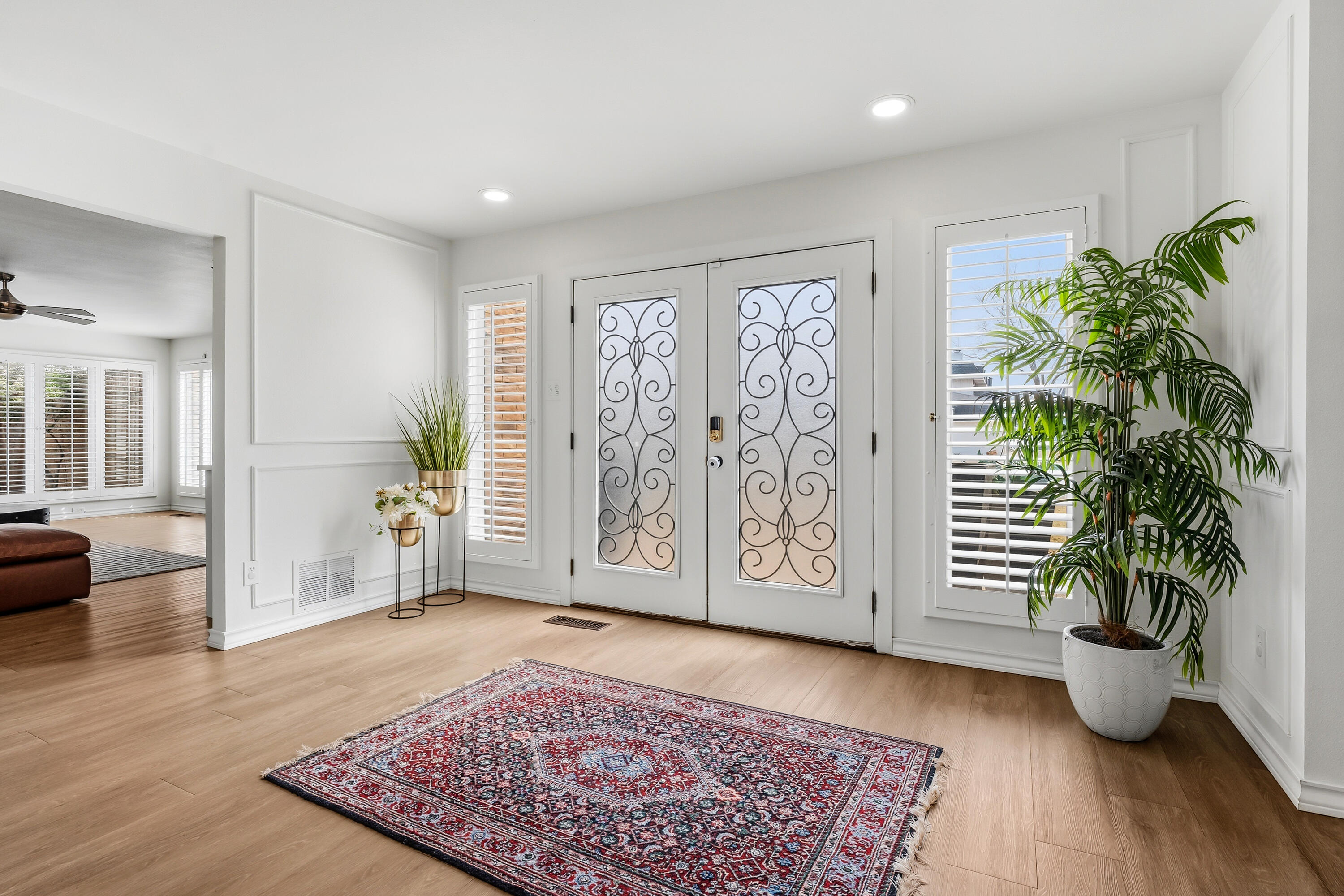 4628 94th Street Lubbock, TX 79424 - Photo 3 of 41 a view of an empty room and window with wooden floor
