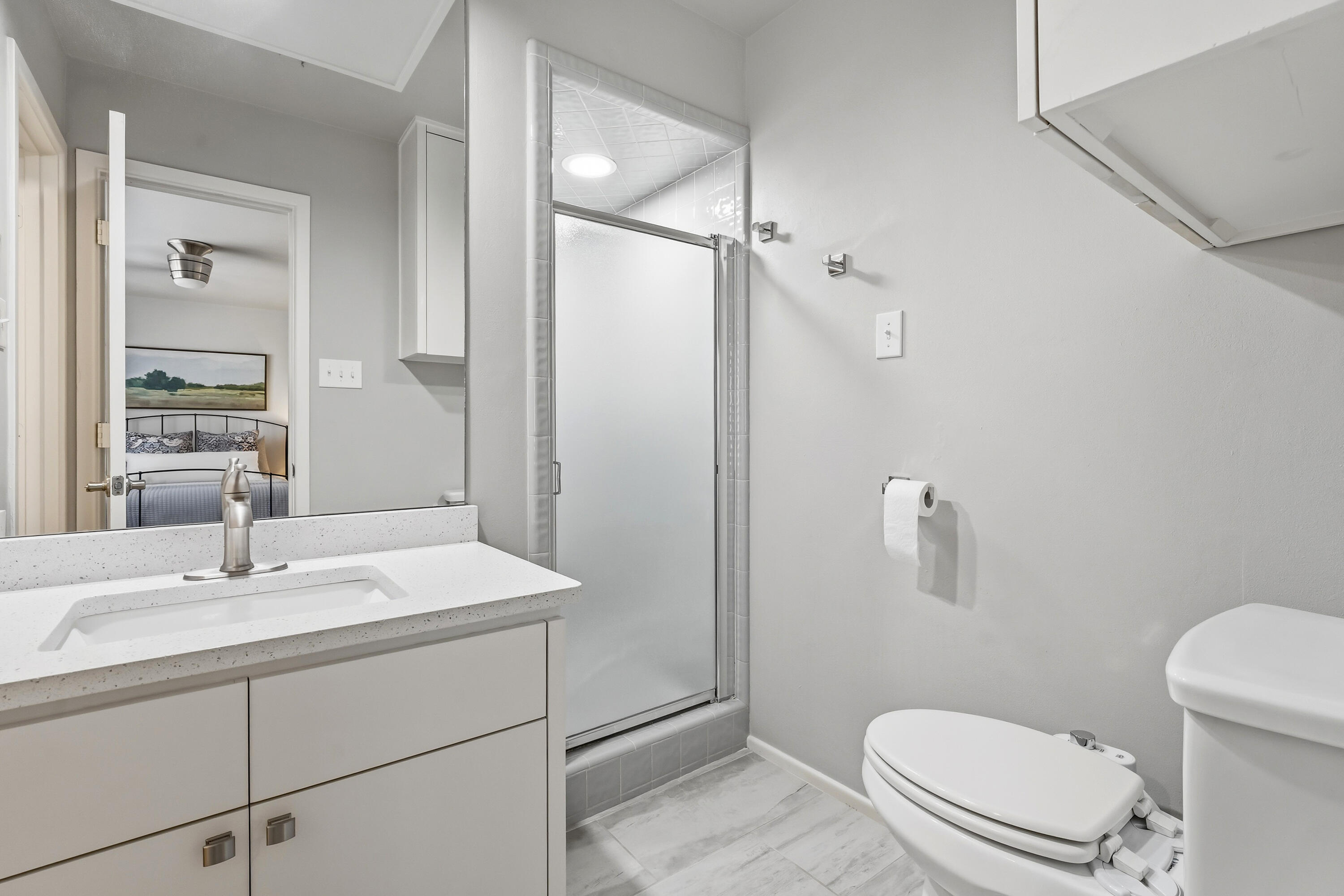 4628 94th Street Lubbock, TX 79424 - Photo 31 of 41 a bathroom with a sink toilet and shower