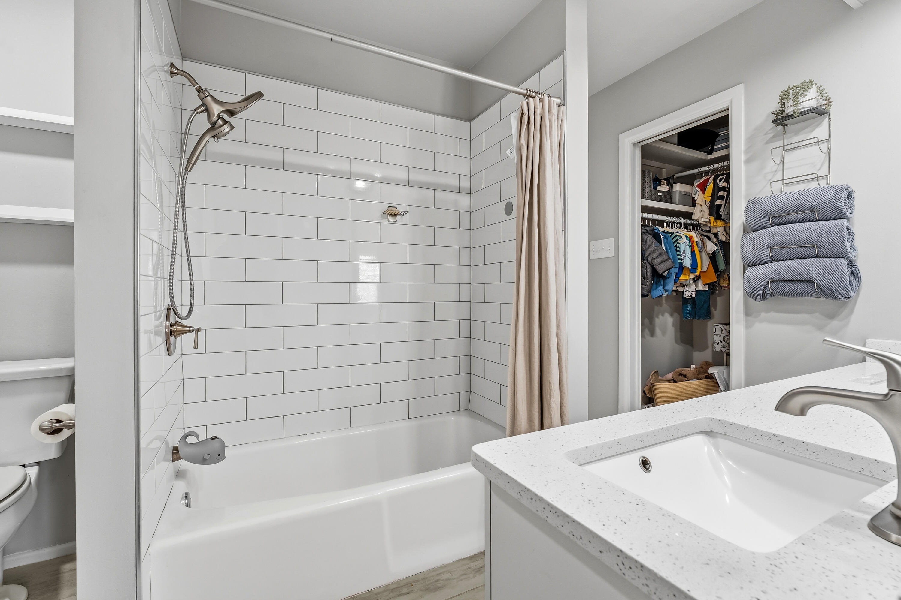 4628 94th Street Lubbock, TX 79424 - Photo 36 of 41 a bathroom with a sink and a bathtub