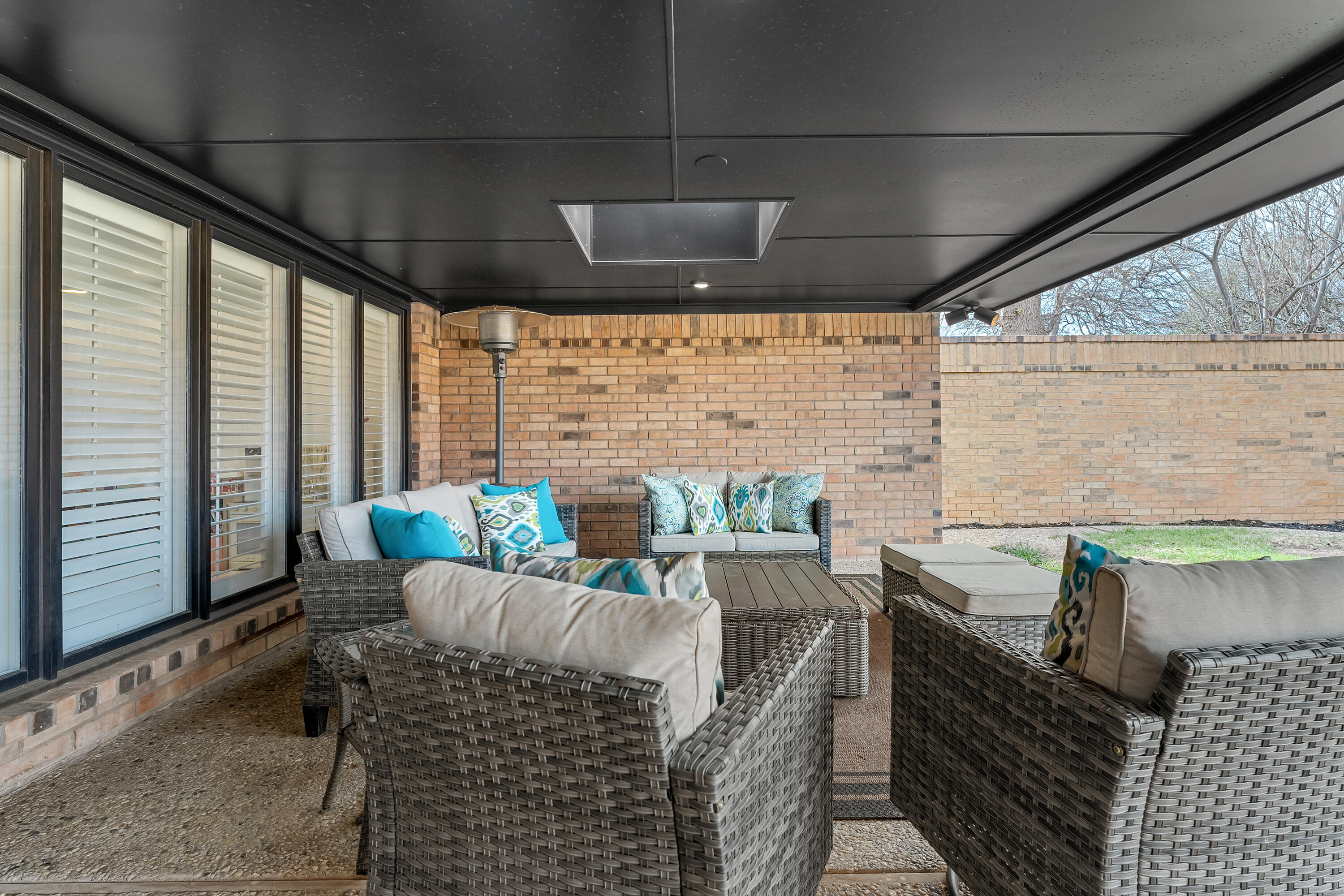 4628 94th Street Lubbock, TX 79424 - Photo 37 of 41 a outdoor living space with furniture
