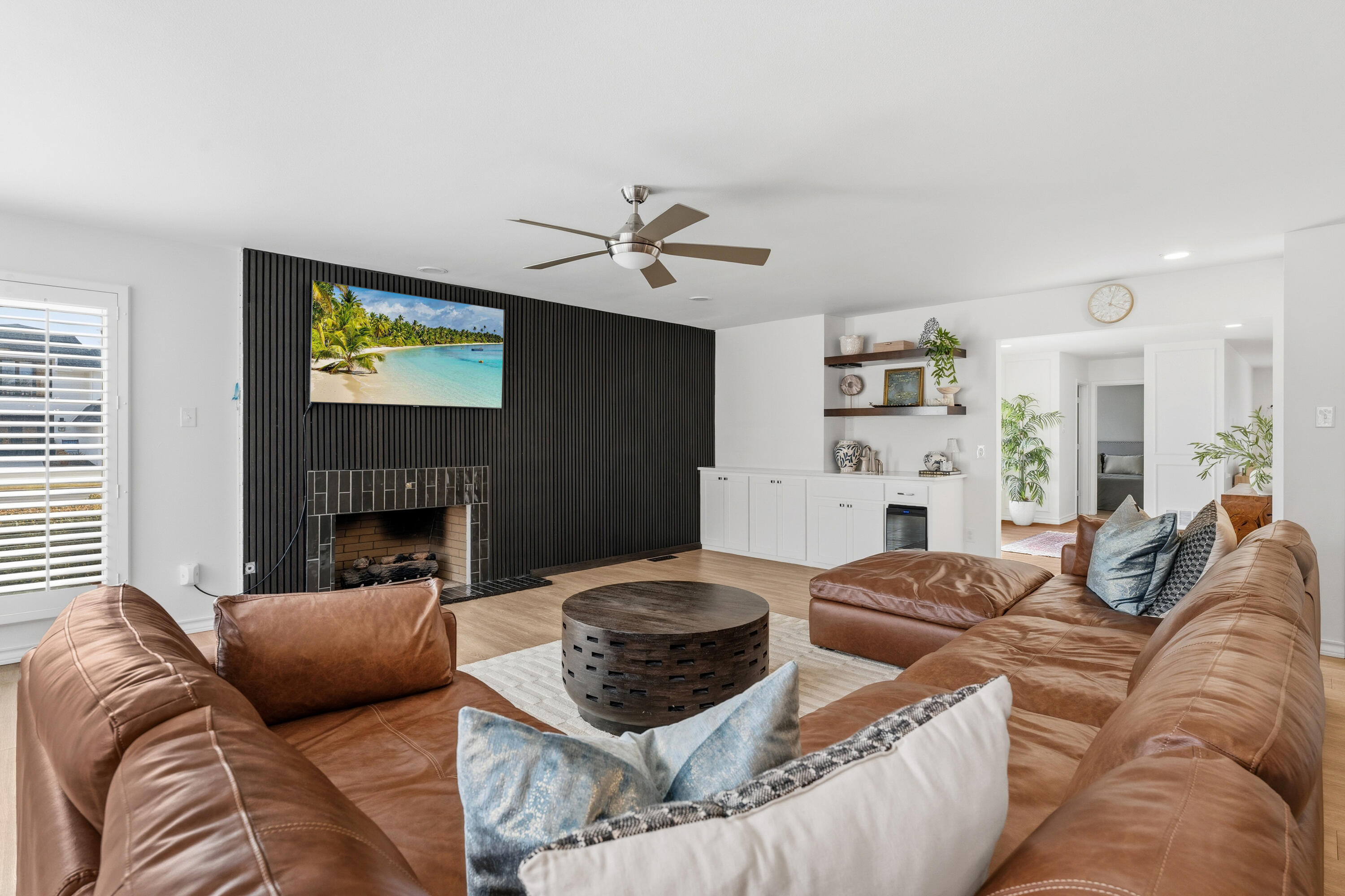 4628 94th Street Lubbock, TX 79424 - Photo 5 of 41 a living room with furniture and a fireplace