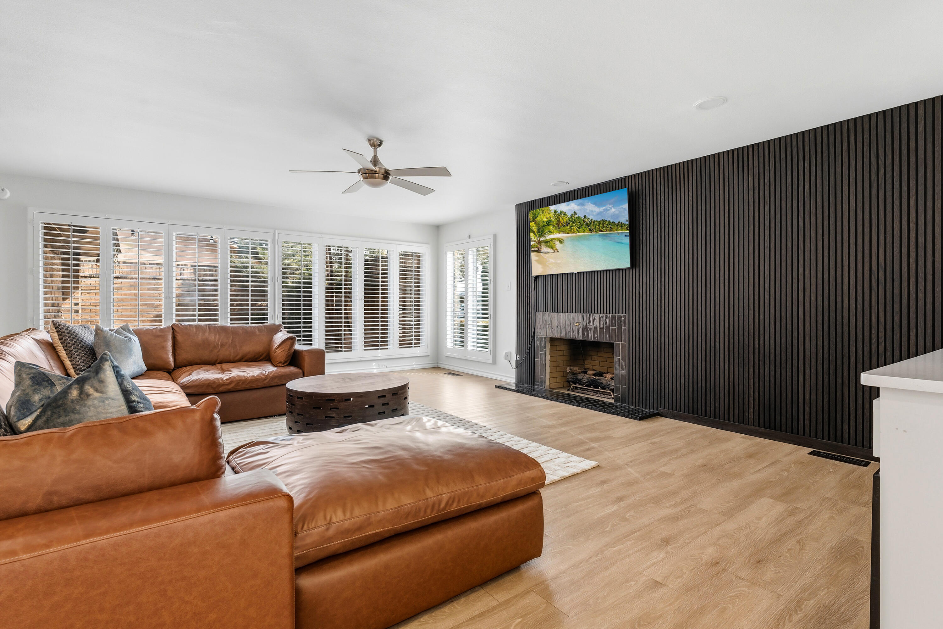 4628 94th Street Lubbock, TX 79424 - Photo 6 of 41 a living room with furniture and a fireplace