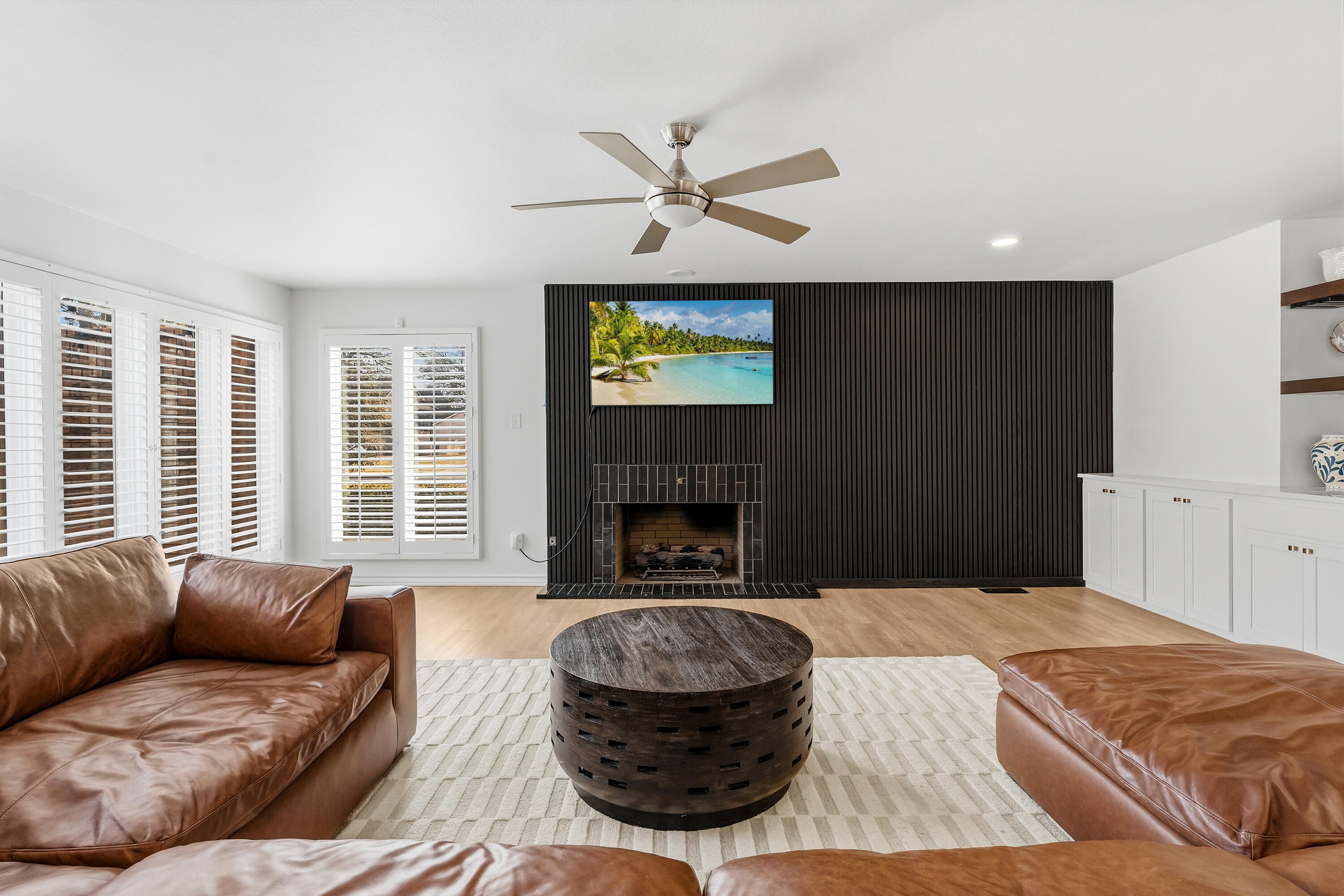 4628 94th Street Lubbock, TX 79424 - Photo 7 of 41 a living room with furniture and a fireplace