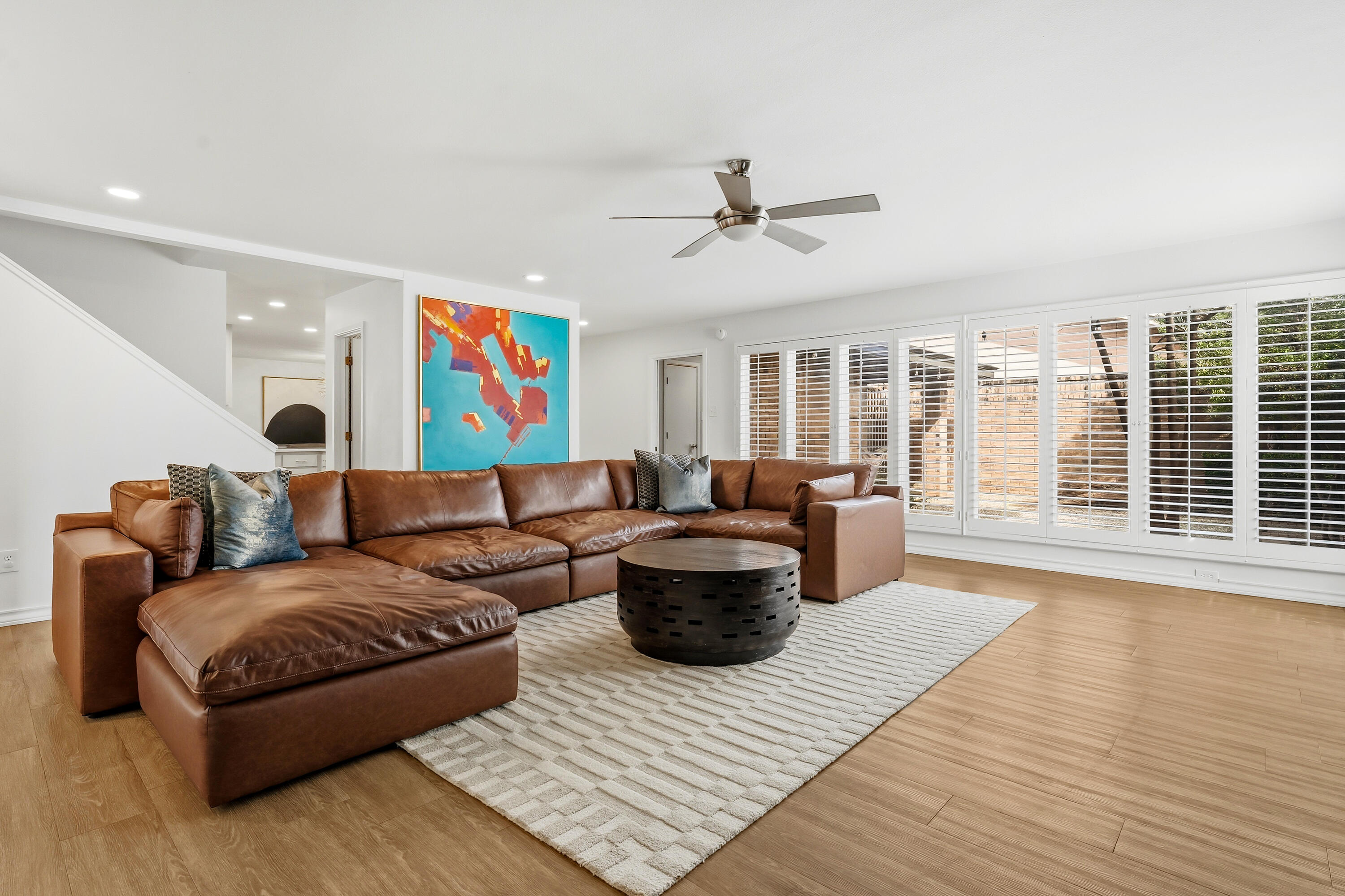 4628 94th Street Lubbock, TX 79424 - Photo 8 of 41 a living room with furniture and a large window