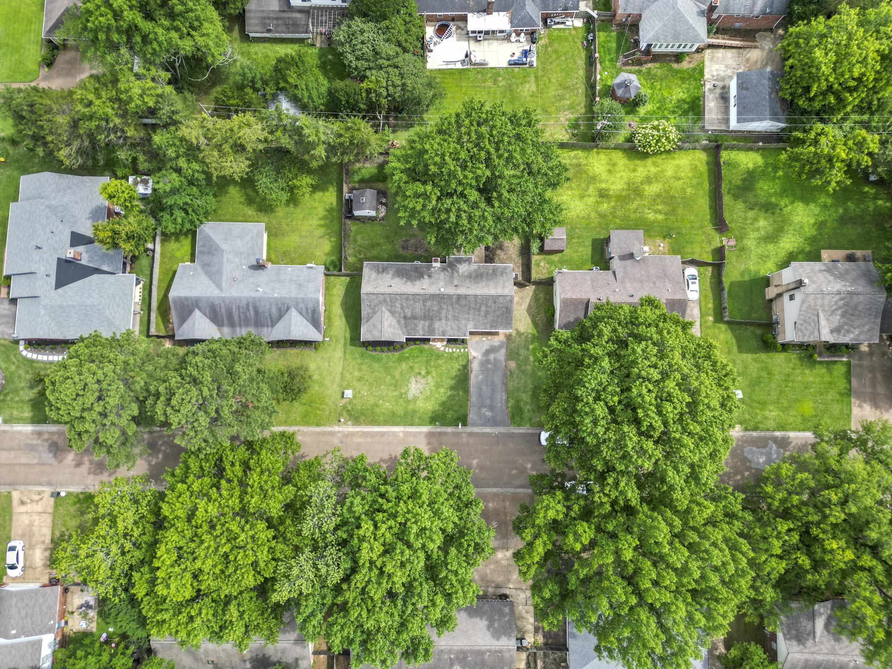 499 Duscoe Street Collierville, TN 38017 - Photo 34 of 38 an aerial view of a house with yard
