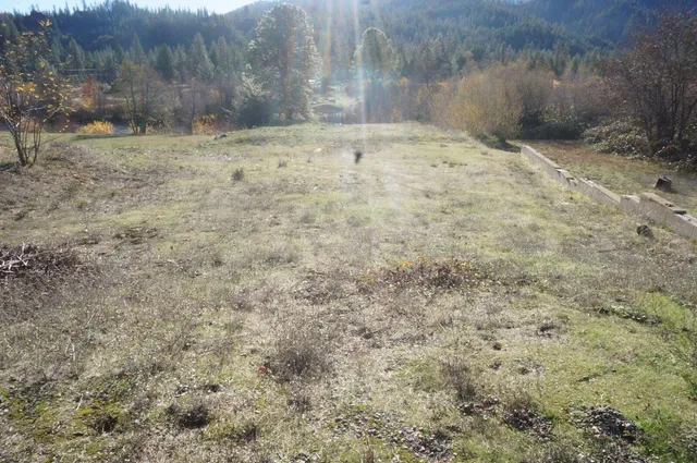 a view of outdoor space and green field