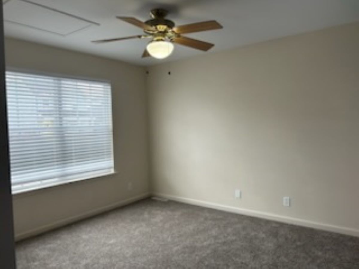 711 Prospect Street Kirkland, IL 60146 - Photo 17 of 23 an empty room with a window